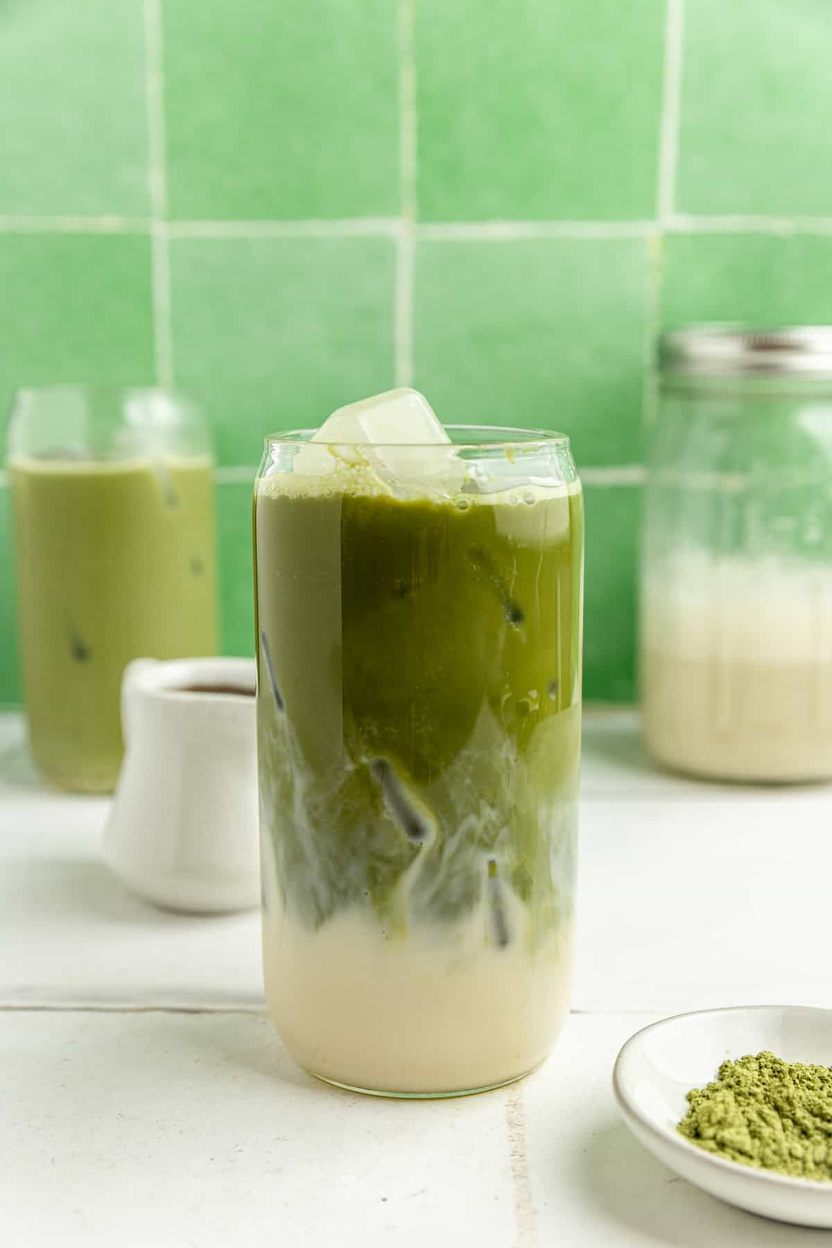 A Vegan Iced Matcha Latte loaded with ice.