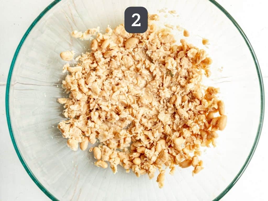 Vegan White Bean Burgers Step 2 - mash the beans.