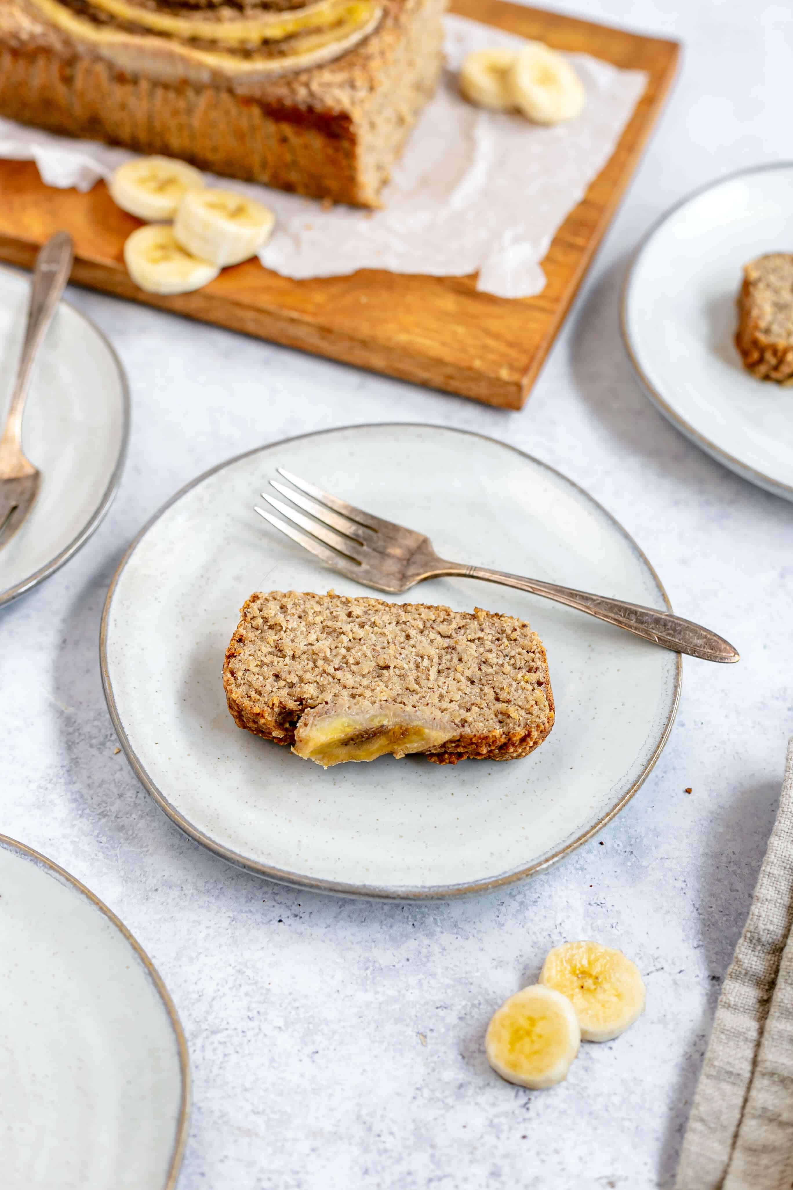 Plant-Based Blender Banana Bread sliced on a plate