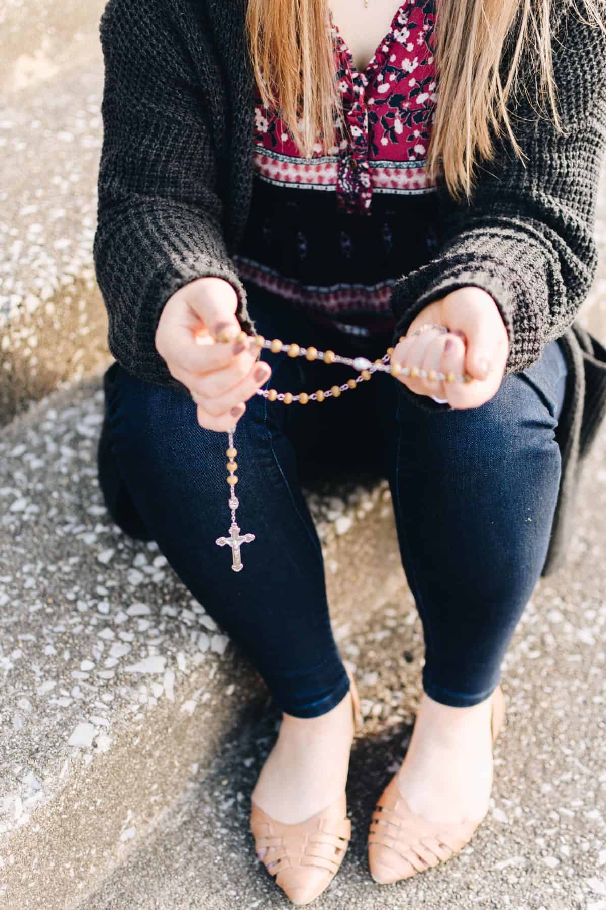 Elizabeth praying the rosary
