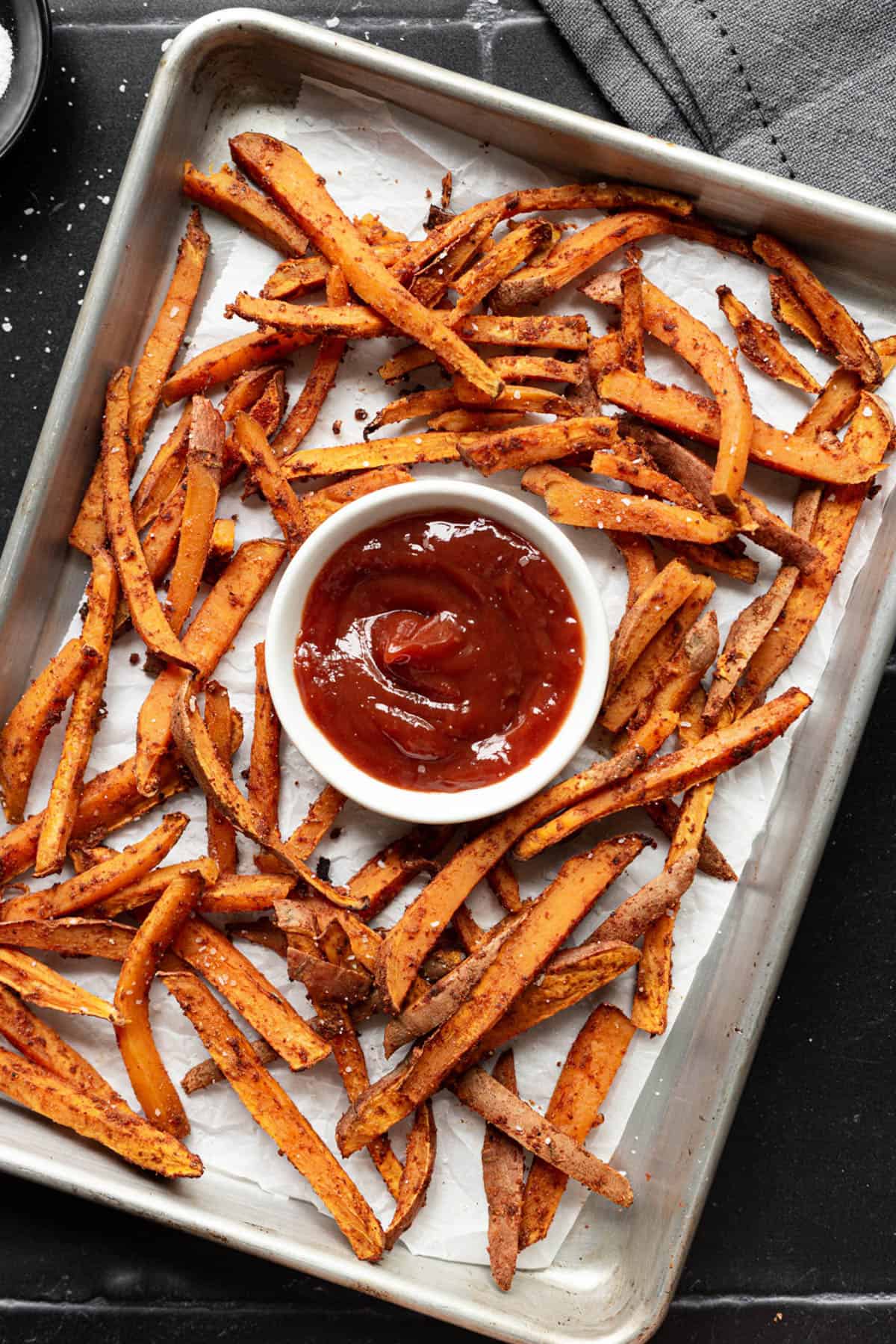 A tray of baked sweet potato fries.