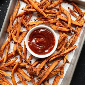 A tray of baked sweet potato fries.