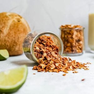 A jar of coconut lime granola tipped on its side.