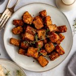 A plate of coffee molasses baked tempeh.