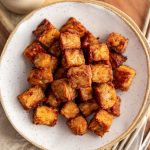 A plate of crispy baked tempeh.