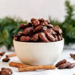 A bowl of gingerbread almonds.