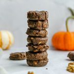 A stack of molasses pumpkin walnut cookies.