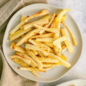 A plate of oil-free roasted parsnips.