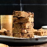 A stack of vegan peanut butter blondies.