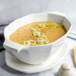 A bowl of vegan potato leek soup.