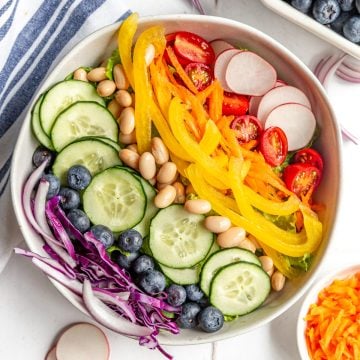 A bowl of rainbow salad.