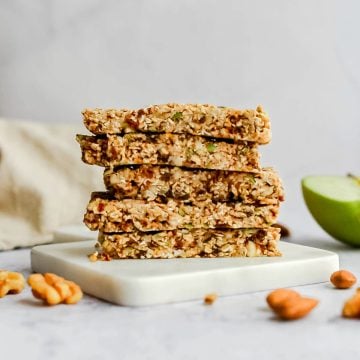 A stack of raw apple pie granola bars.