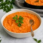 A bowl of roasted root vegetable soup.