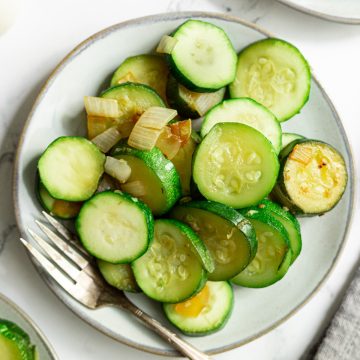 A plate of sautéed zucchini.