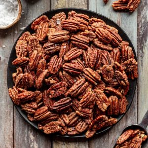 A plate of cinnamon roasted pecans.
