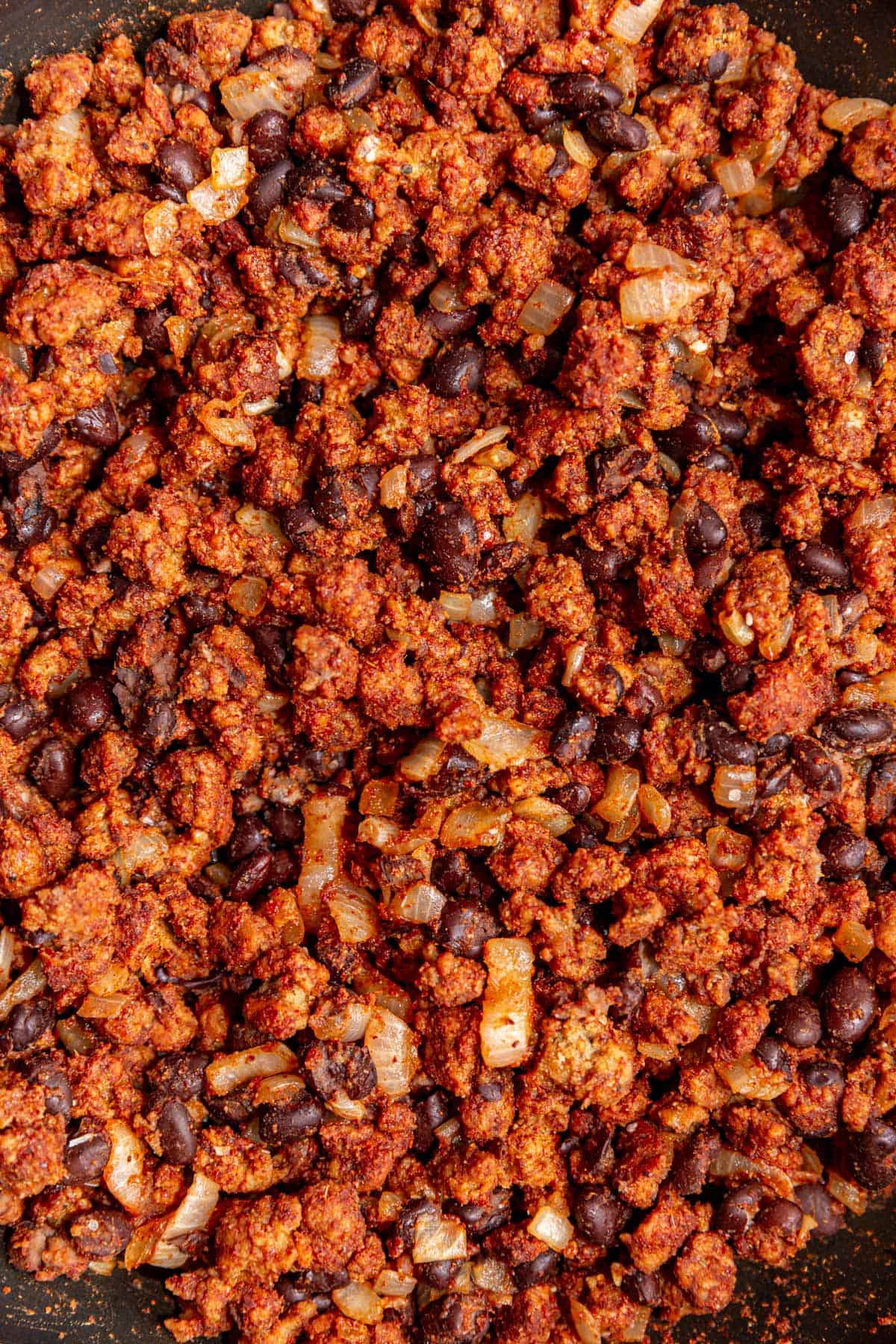 A close up image of the texture of the seitan taco meat.