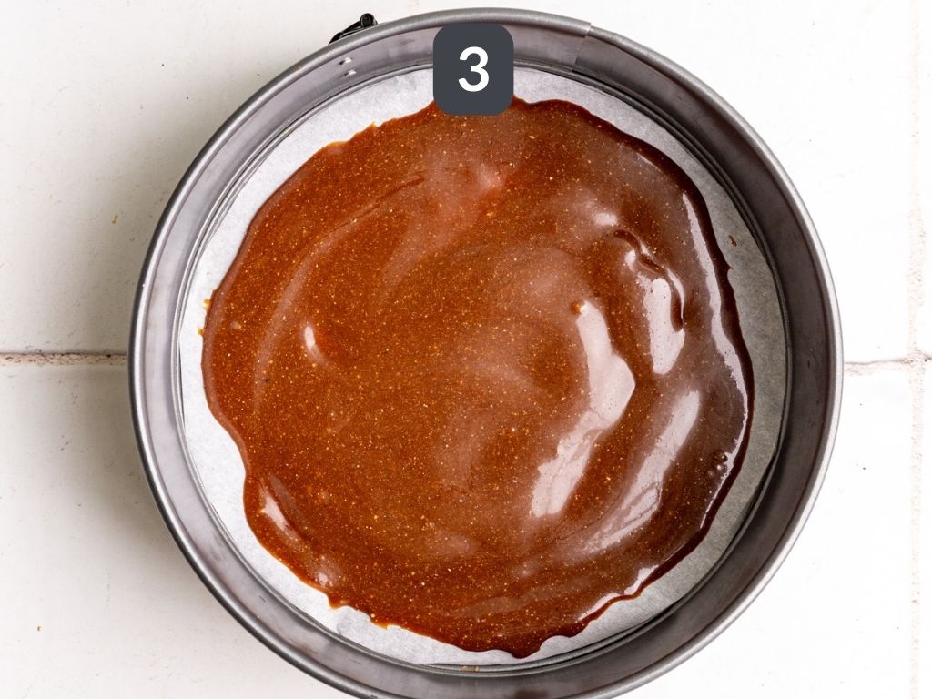 Vegan Caramel Apple Upside Down Cake step 3 - spread the caramel into the pan.