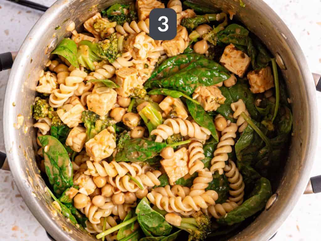 Vegan creamy spinach pasta step 3 - toss in the remaining ingredients.