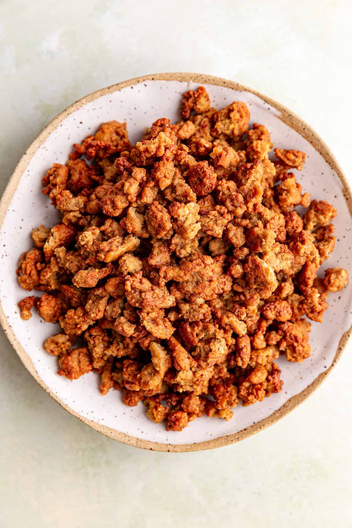 A bowl of vegan ground beef crumbles.