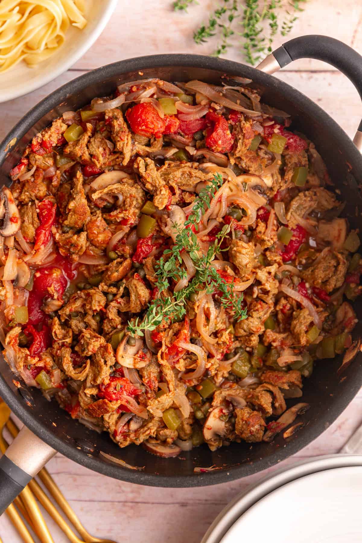 A pan of freshly cooked vegan cacciatore, ready to serve.