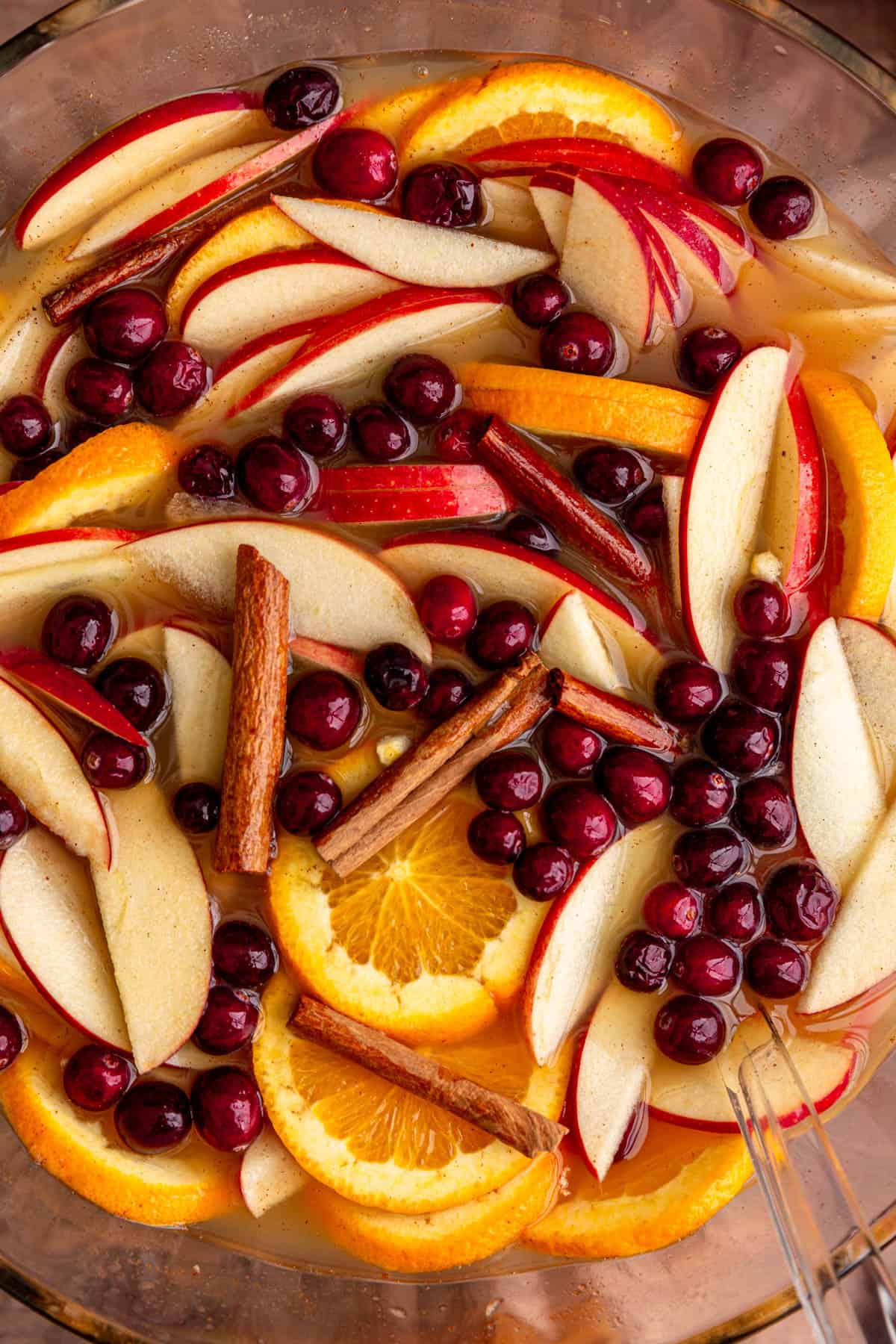 A punch bowl full of non-alcoholic Thanksgiving punch.