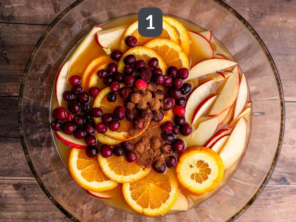 Non-Alcoholic Thanksgiving Punch Step 1 - mix the juice and fruit.