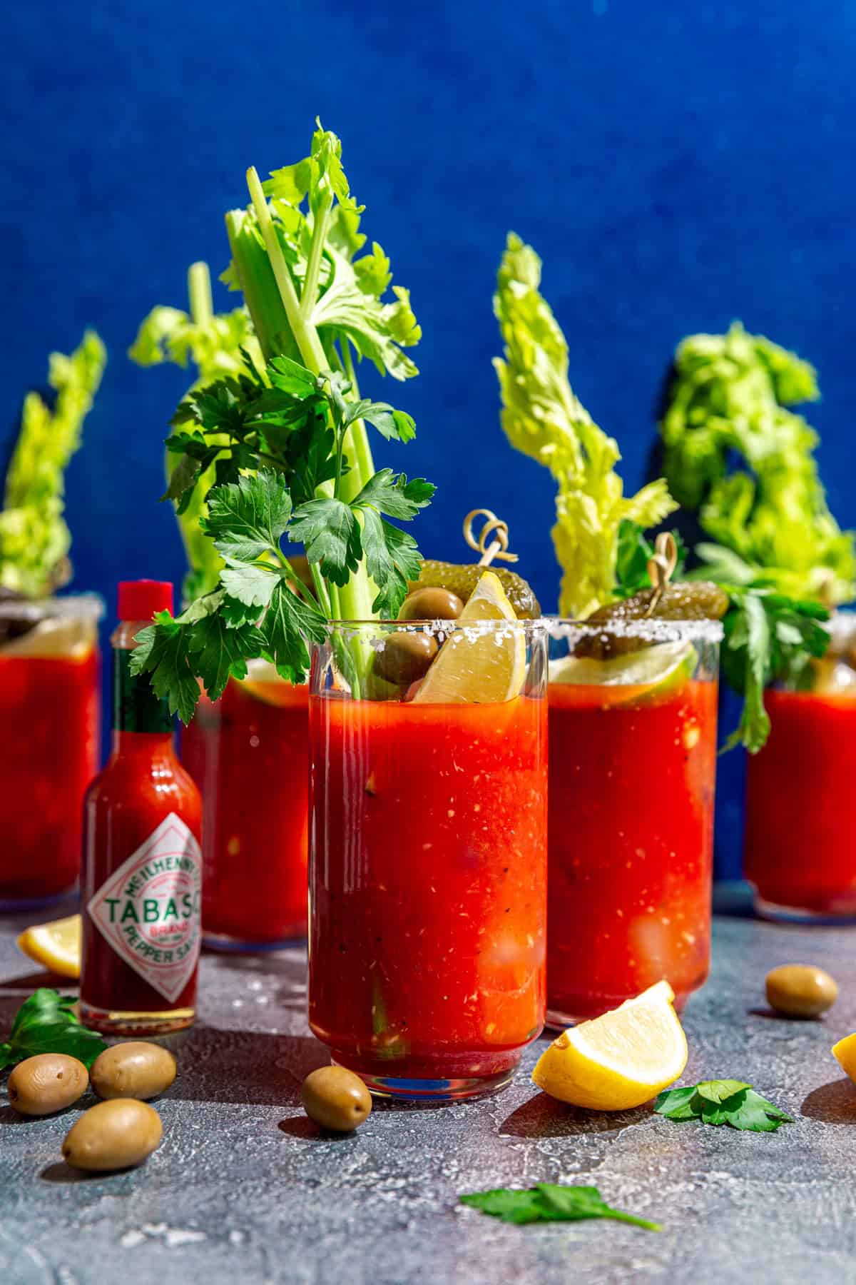 Several bloody mary glasses.