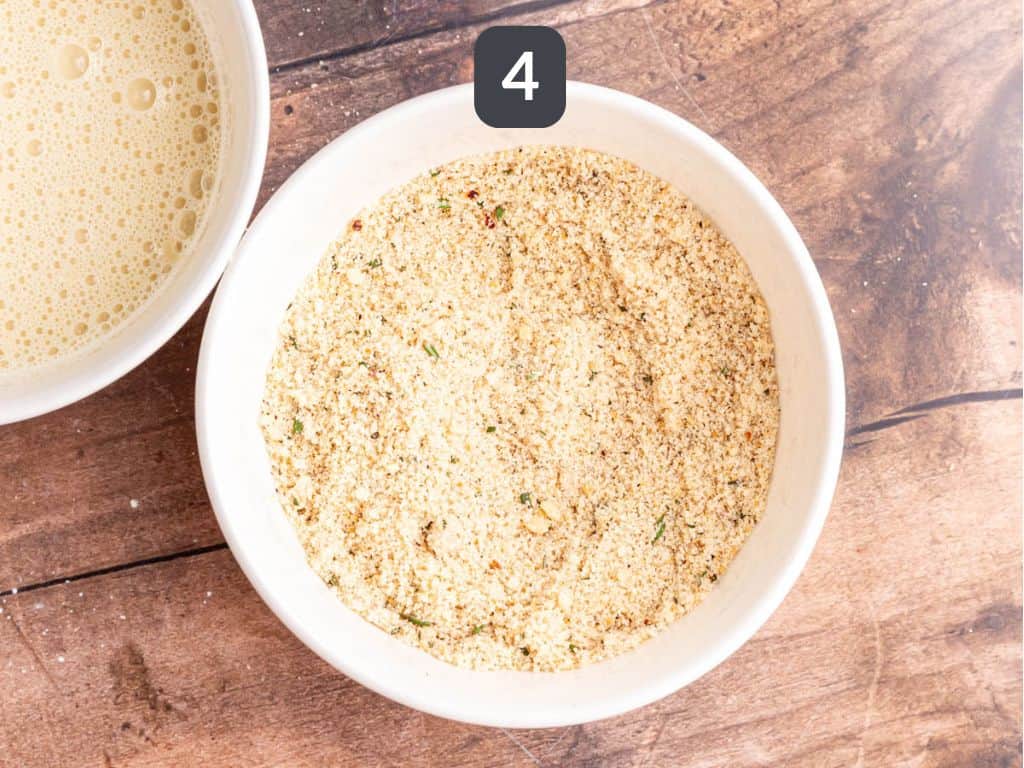 Christmas tofu step 4 - mix the breadcrumbs, hazelnuts, and rosemary.