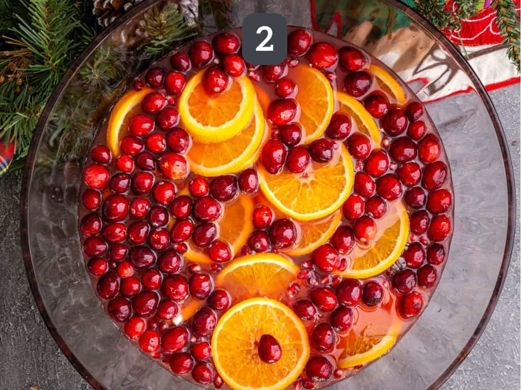 Non-Alcoholic Christmas Punch Step 2 - add club soda.