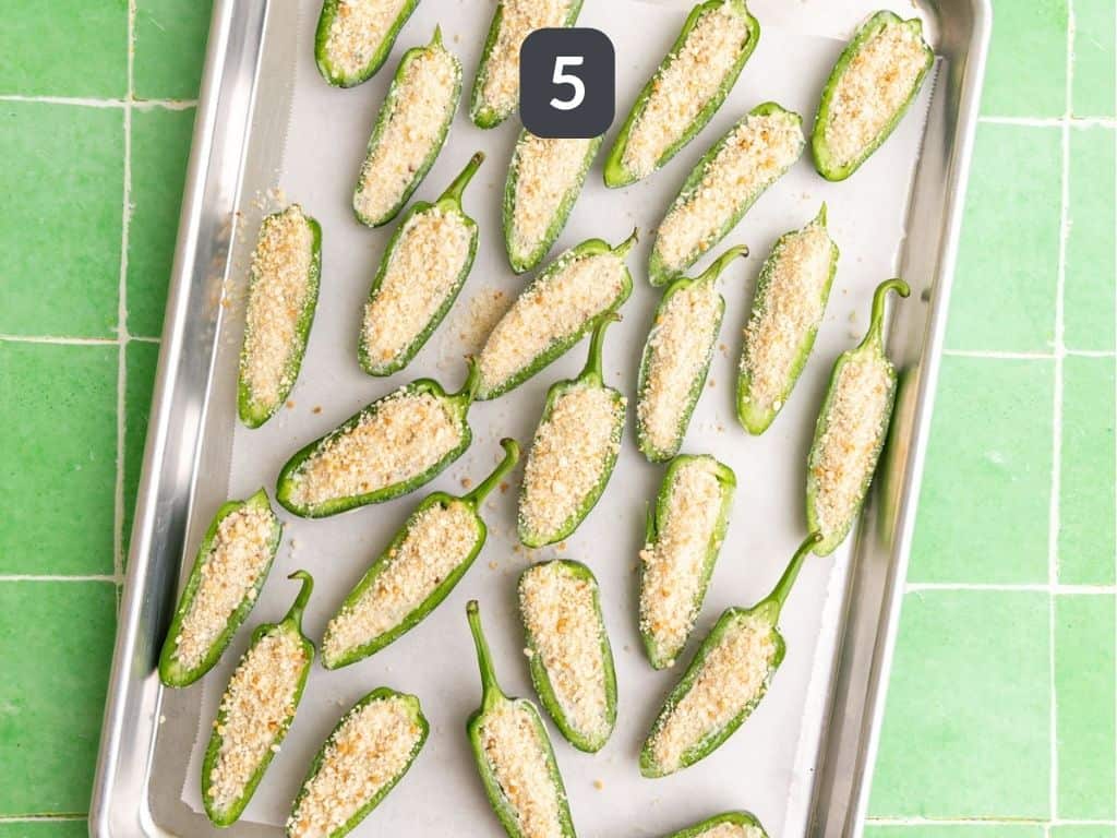 Vegan Jalapeño Poppers Step 5 - sprinkle the peppers with breadcrumbs.