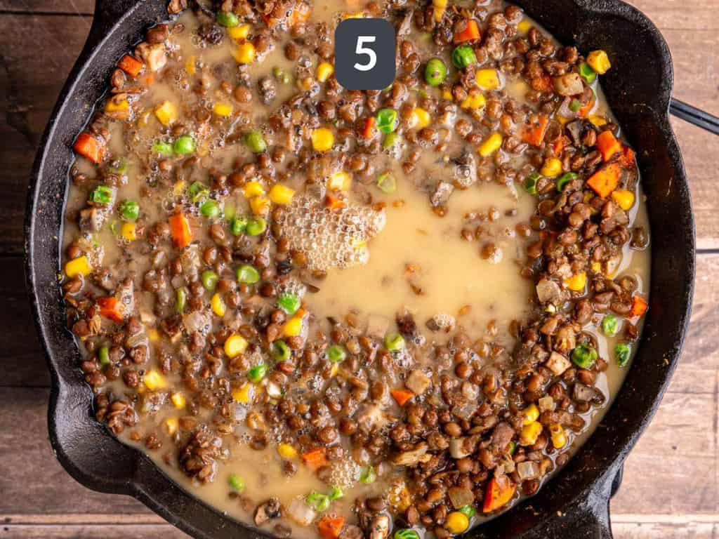Vegan Lentil Shepherd's Pie Step 5 - pour the slurry into the filling.