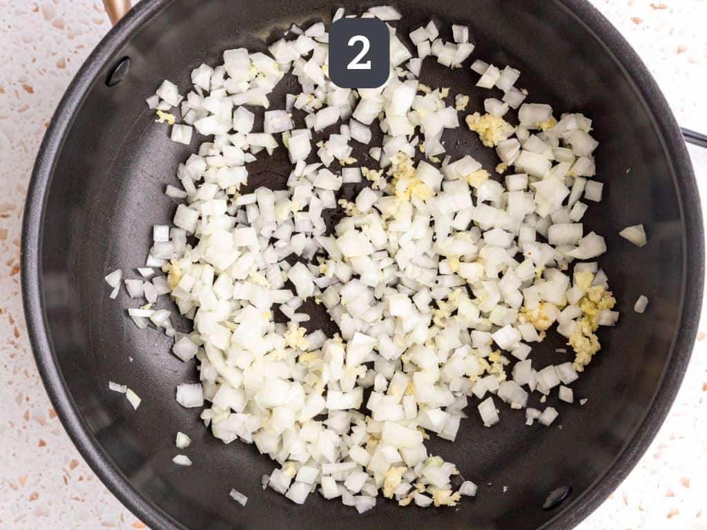 Sweet Potato Gratin Step 2 - sauté the onion and garlic.