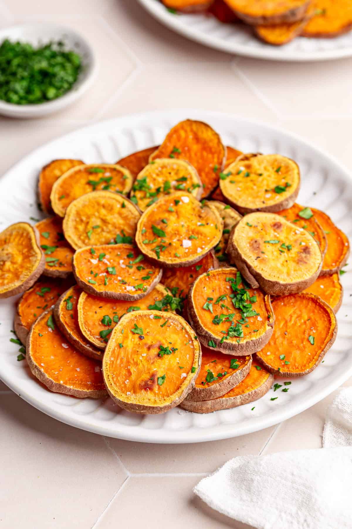 A plate of sweet potato rounds, ready to serve.