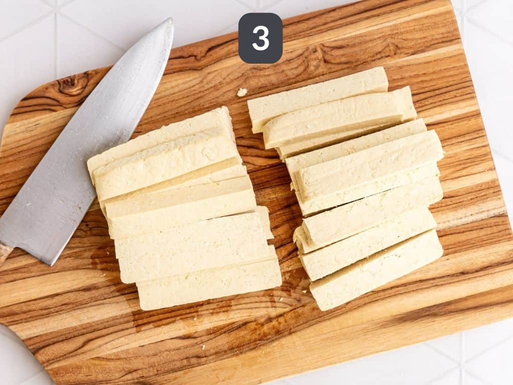 Buffalo Tofu Step 3 - slice the tofu into sticks.