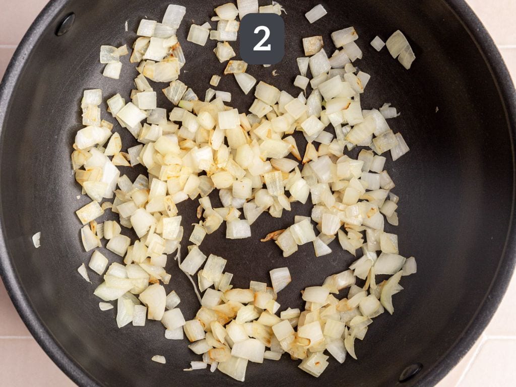 Vegan Cajun Chicken Pasta Step 2 - cook the onion.