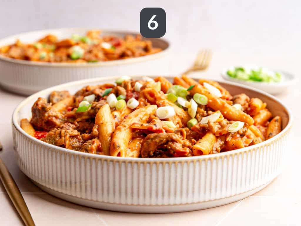 Vegan Cajun Chicken Pasta Step 6 - serve with scallions.
