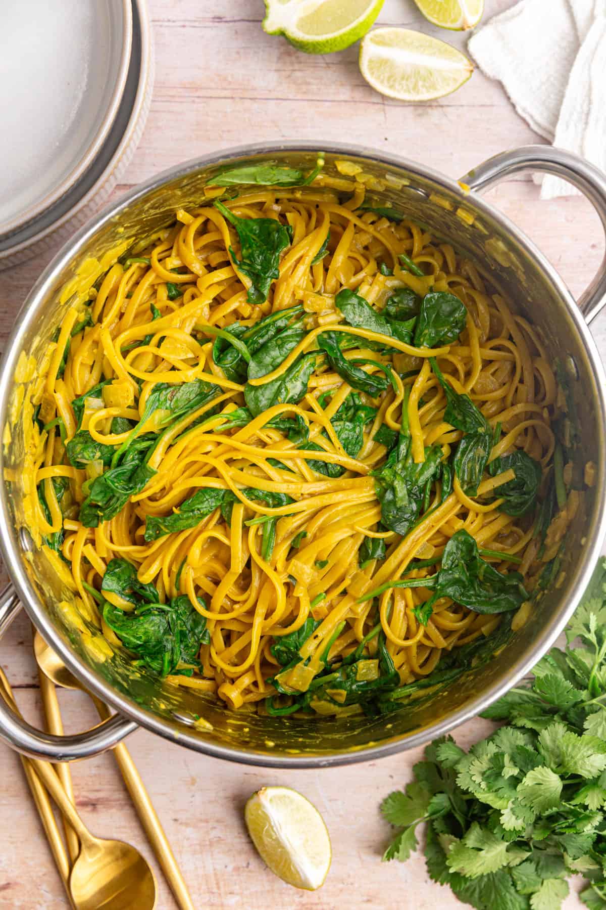 A pot of freshly cooked curry pasta, ready to serve.