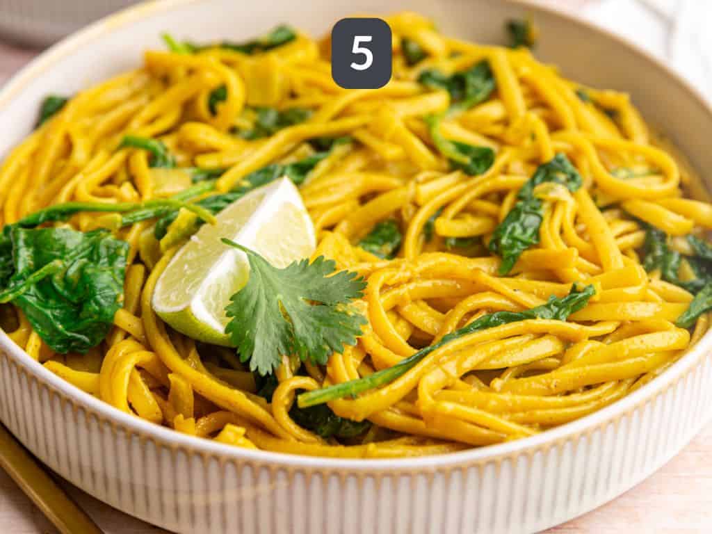 Vegan curry pasta step 5 - serve with lime and cilantro.