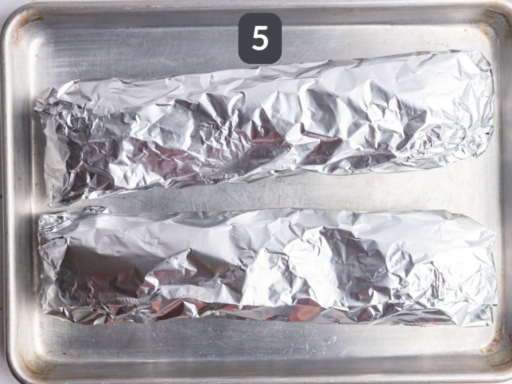 Vegan Garlic Bread Step 5 - place the halves back together and wrap in foil
