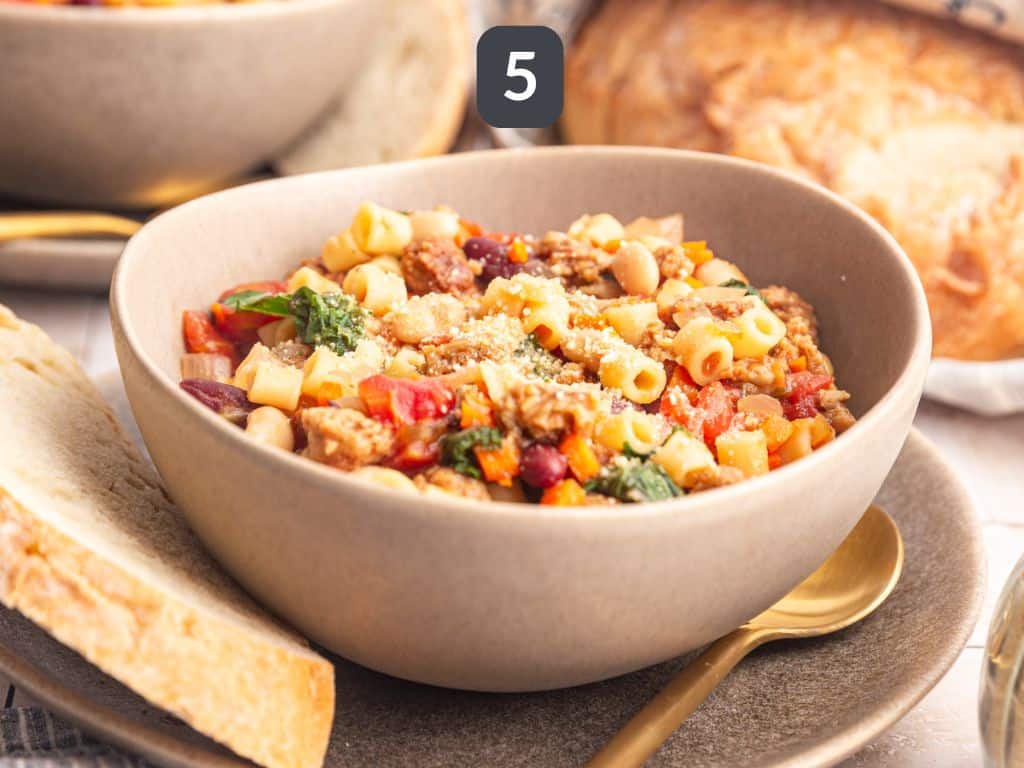 Vegan Pasta e Fagioli Step 5 - serve with bread and vegan parmesan.