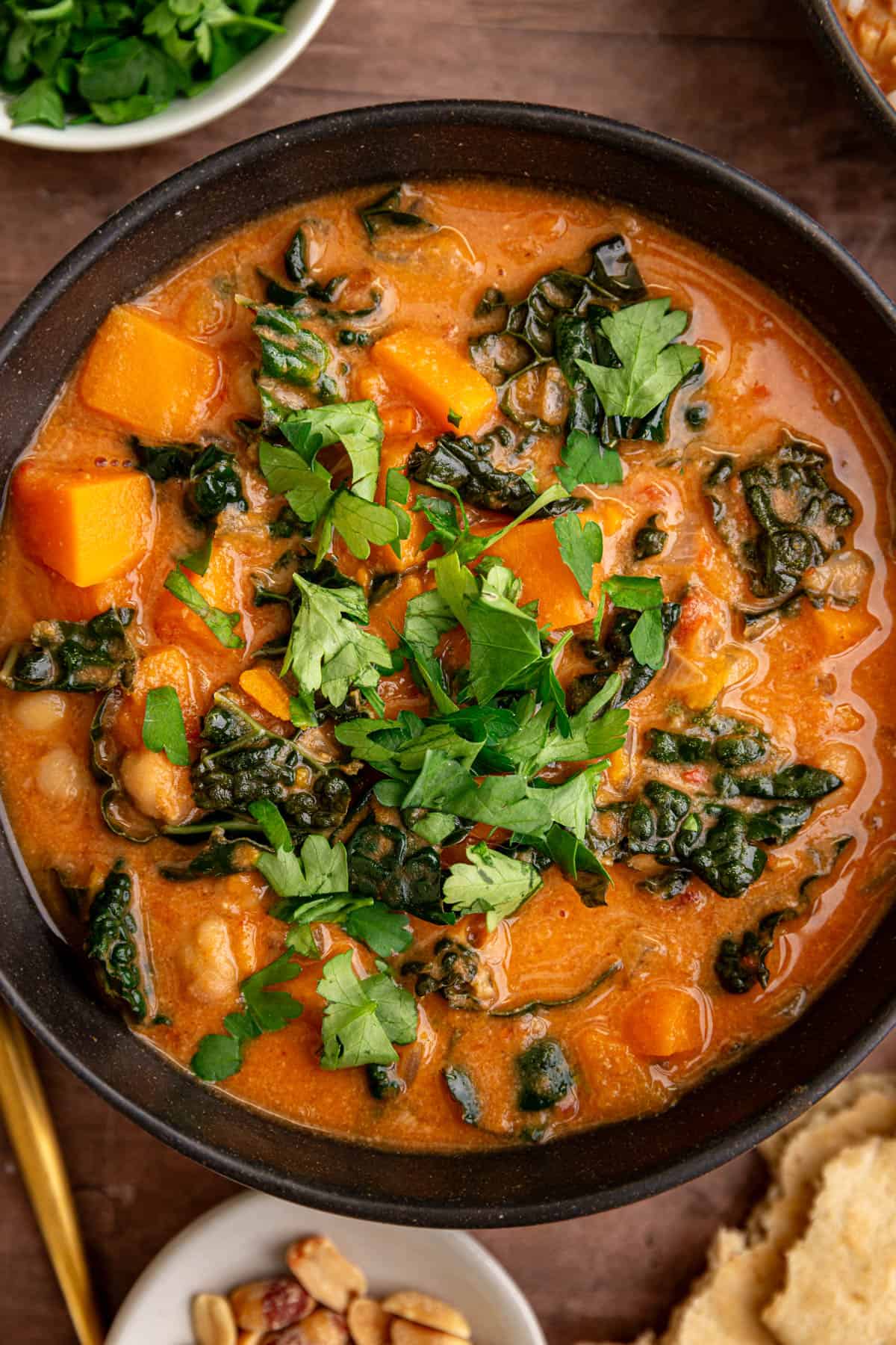 A bowl of Vegan African Peanut Stew, garnished with cilantro.