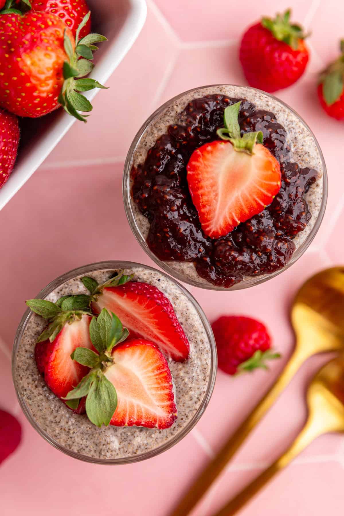 A top down view of two jars of blended chia pudding.