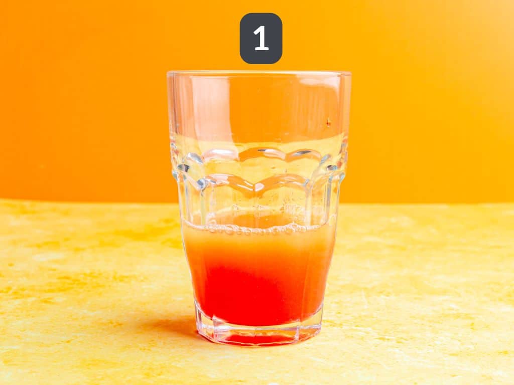 Cinderella mocktail step 1 - mix the juices.