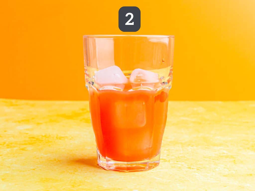 Cinderella mocktail step 2 - add ice.