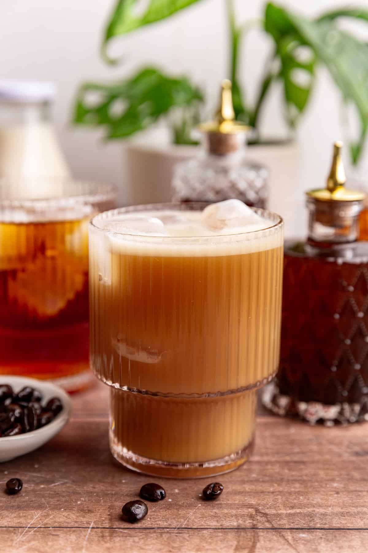 A glass of decaf cold brew with milk mixed in.