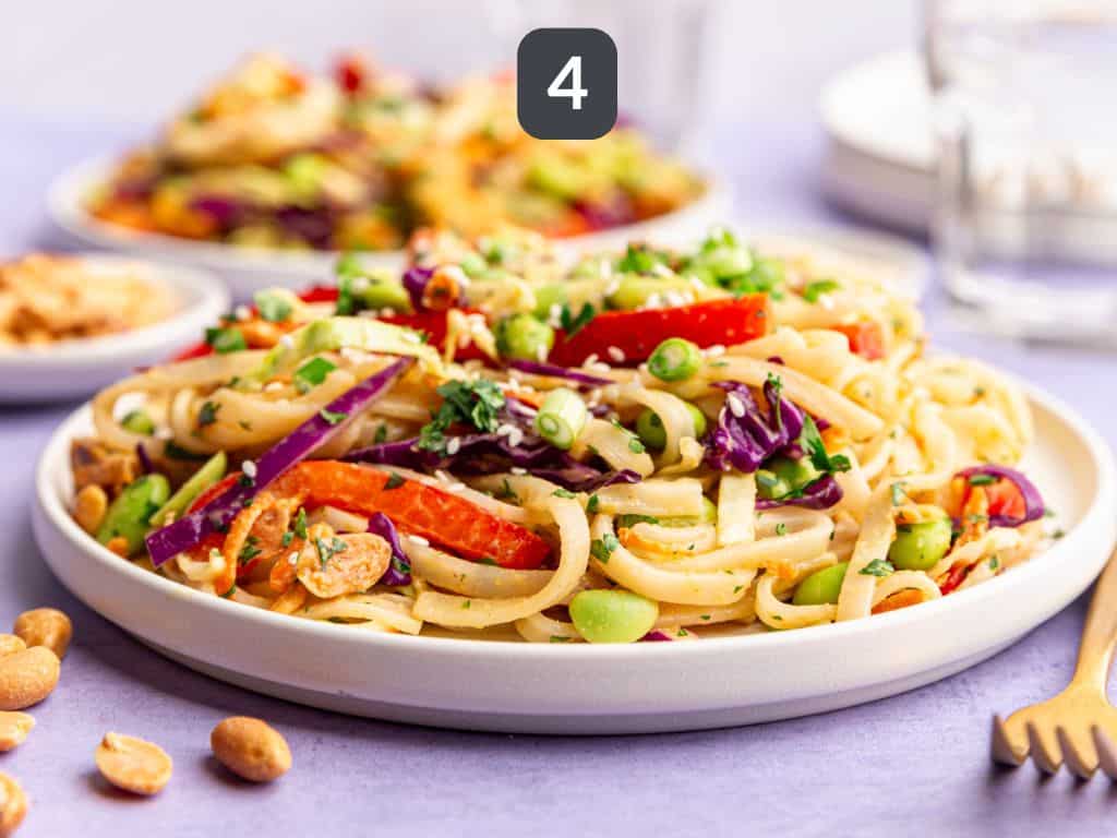 Thai noodle bowl step 4 - garnish with cilantro.