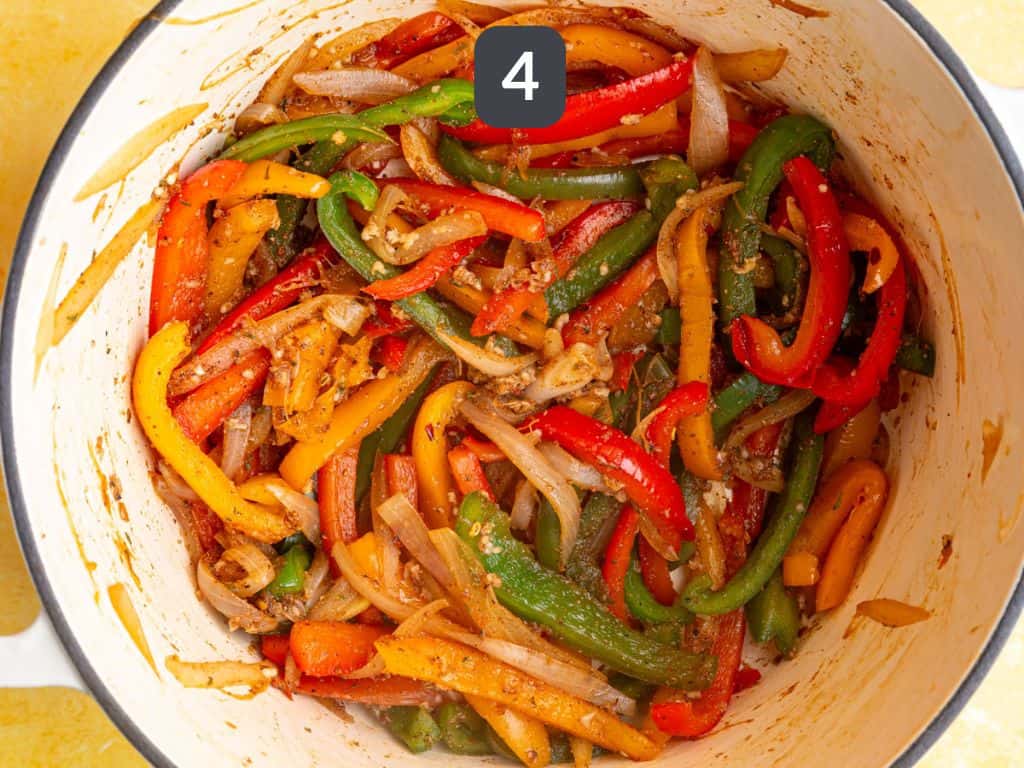 Vegan Rasta Pasta Step 4 - add the jerk seasoning and garlic.