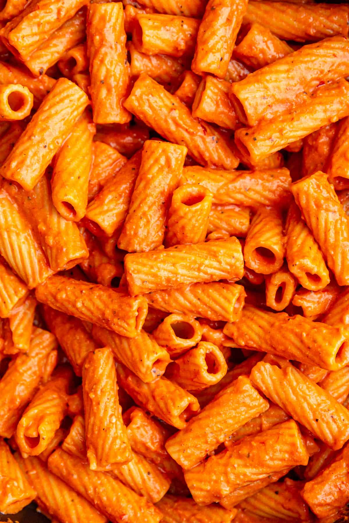 A close up image of the creamy texture of the vodka pasta.