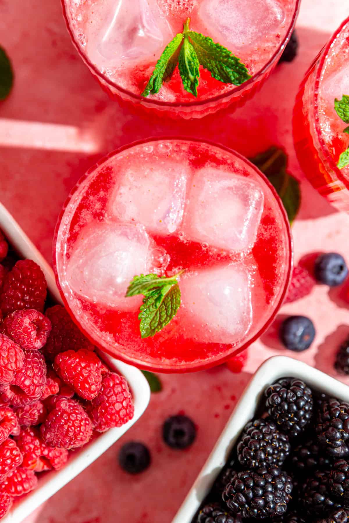 A top-down view of the pink mixed berry moctkail.