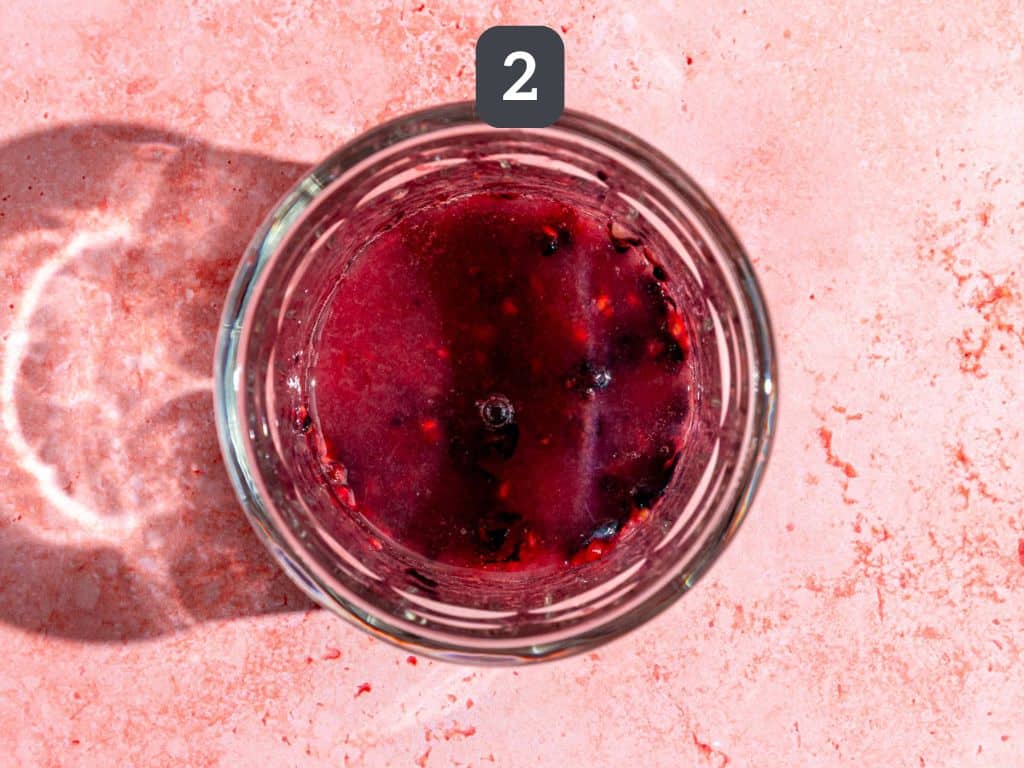 Mixed berry mocktail step 2 - add the lemon juice, vinegar, and syrup